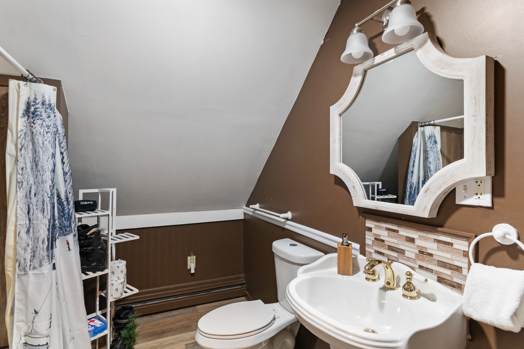 Bathroom with shower and pedestal sink