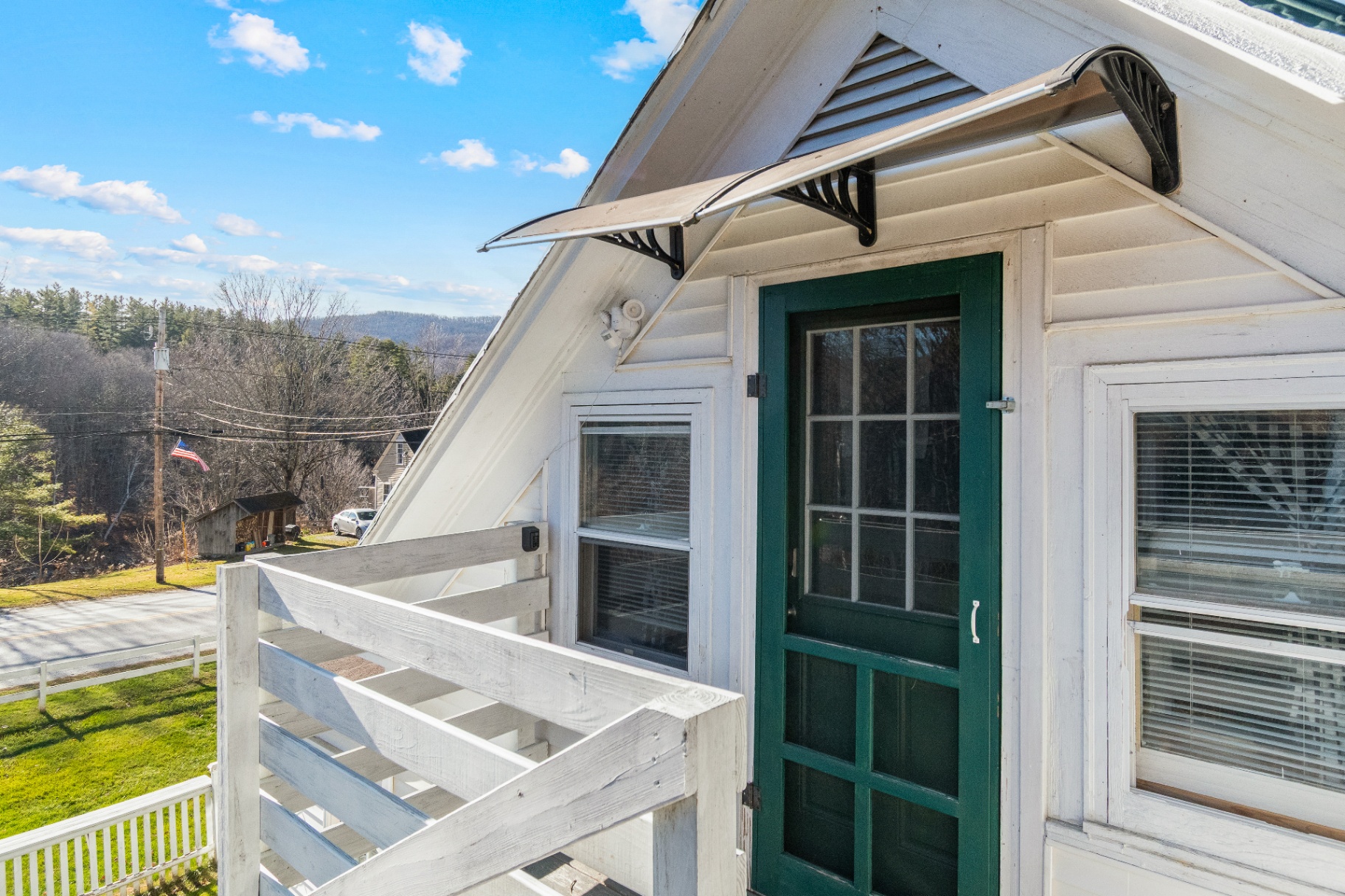 Private entry deck with Vermont hill views